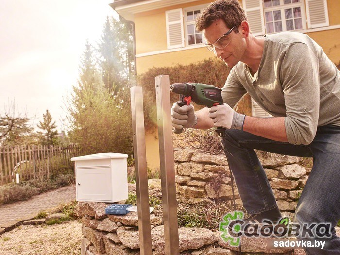 Ударная дрель Bosch UniversalImpact 700 [0603131020]